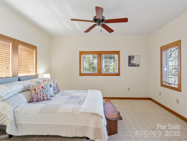 61 Creekside Way Unit G201, Burnsville, NC 28714 - carpeted bedroom featuring multiple windows, baseboards, and ceiling fan
