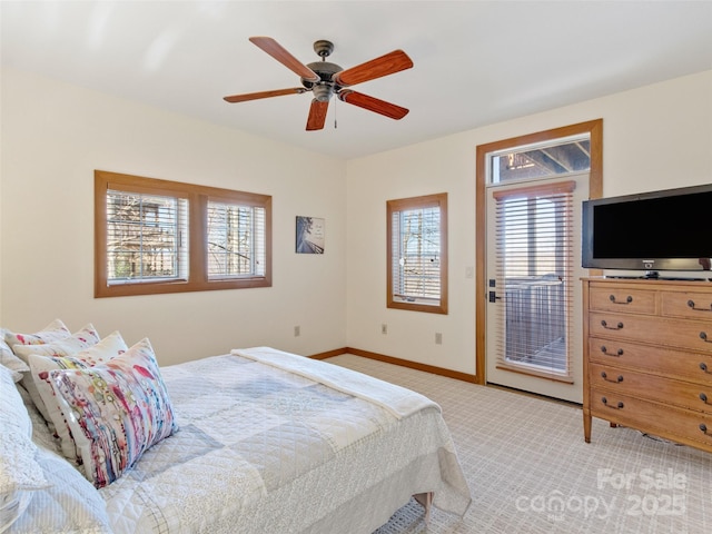 61 Creekside Way Unit G201, Burnsville, NC 28714 - bedroom featuring access to exterior, light carpet, baseboards, and ceiling fan