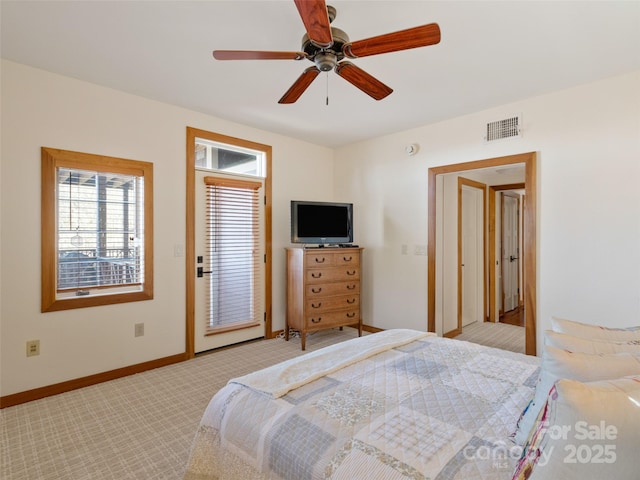 61 Creekside Way Unit G201, Burnsville, NC 28714 - bedroom featuring light carpet, baseboards, a ceiling fan, and access to exterior