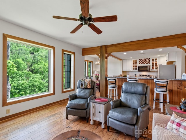 61 Creekside Way Unit G201, Burnsville, NC 28714 - living room with plenty of natural light, wood-type flooring, baseboards, a ceiling fan, and recessed lighting