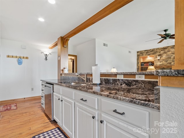 61 Creekside Way Unit G201, Burnsville, NC 28714 - kitchen with a sink, white cabinetry, light wood-style floors, dark stone countertops, and recessed lighting