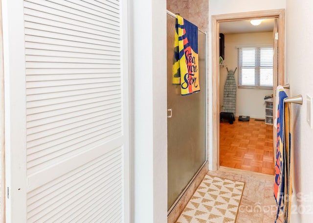 bathroom featuring a stall shower