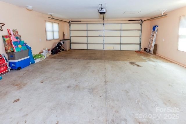 garage featuring a garage door opener