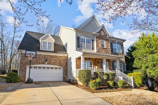 view of front of home with covered porch, concrete driveway, a shingled roof, a garage, and brick siding