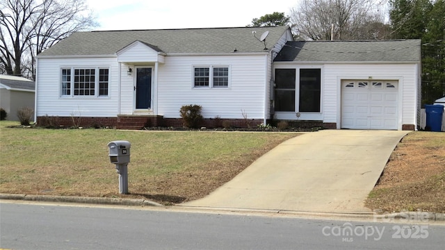 ranch-style home with entry steps, concrete driveway, roof with shingles, an attached garage, and a front lawn