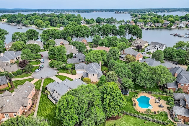 bird's eye view with a residential view and a water view