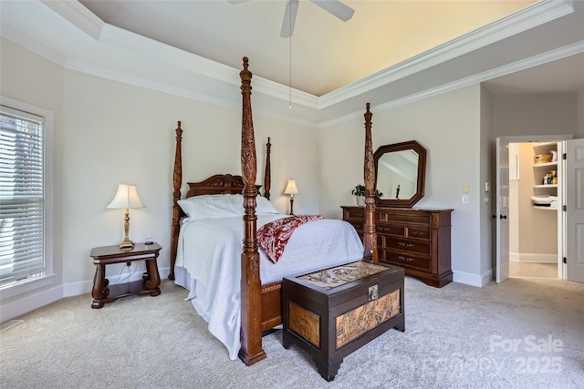 bedroom with carpet, baseboards, and crown molding