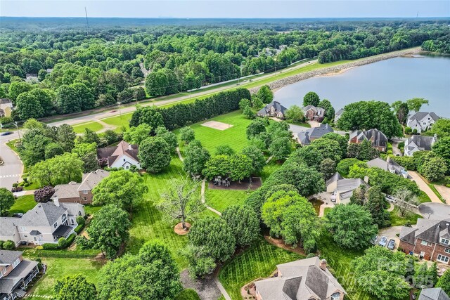 aerial view featuring a water view and a residential view