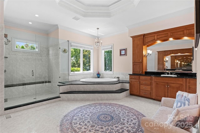 bathroom with visible vents, ornamental molding, a stall shower, an inviting chandelier, and a bath