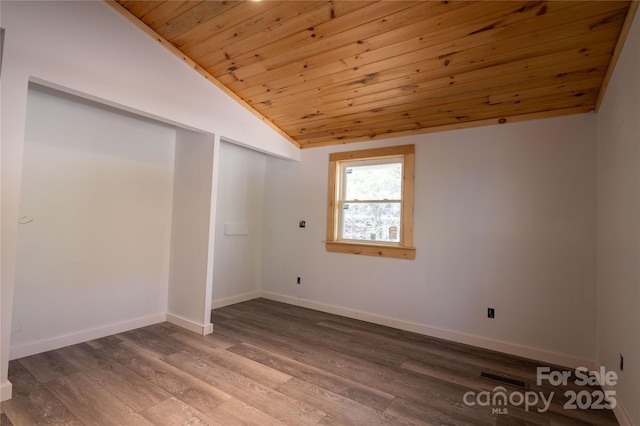 interior space with visible vents, baseboards, wooden ceiling, wood finished floors, and vaulted ceiling