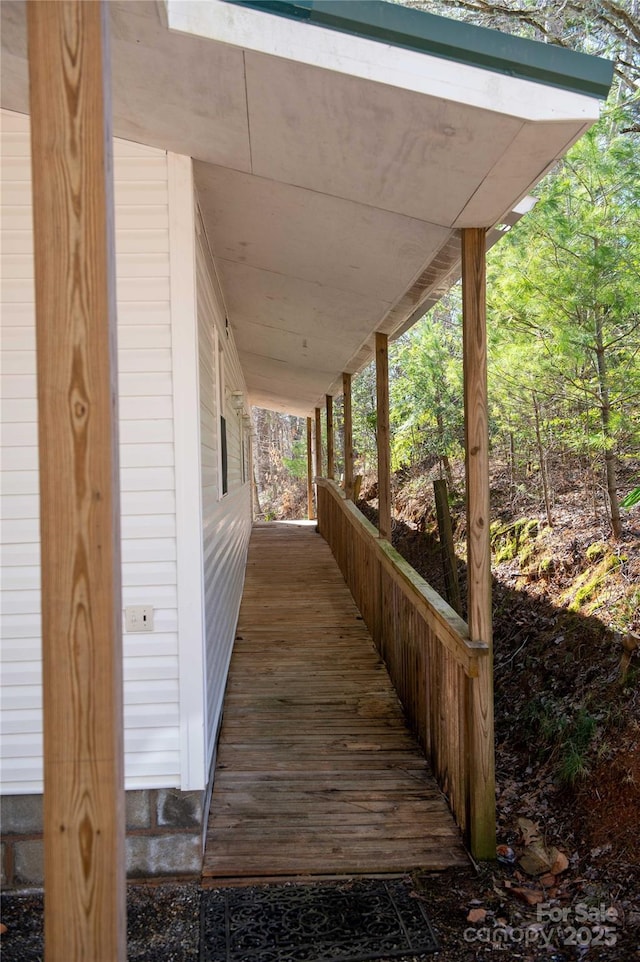 wooden terrace with covered porch