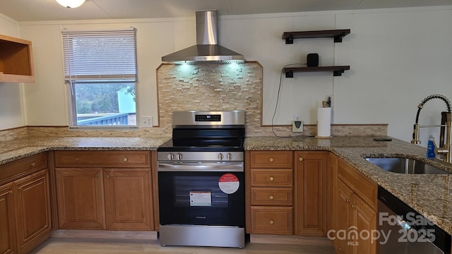 kitchen featuring wall chimney exhaust hood, appliances with stainless steel finishes, open shelves, and a sink