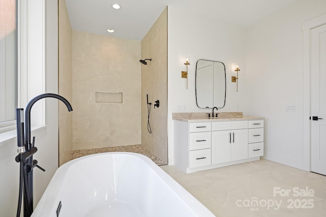 full bathroom featuring tiled shower, marble finish floor, a bathtub, vanity, and recessed lighting