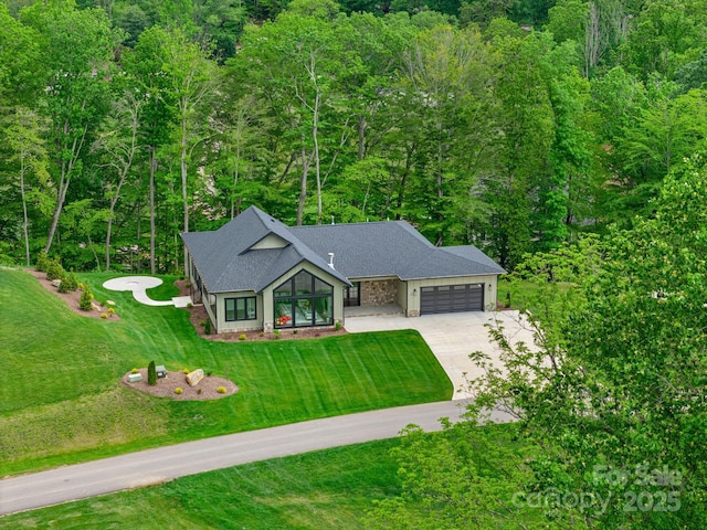 90 Bridgeway Dr Unit 25, Candler, NC 28715 - aerial view of property and surrounding area with a forest