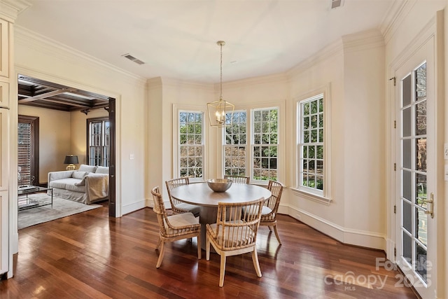 dining space featuring baseboards, visible vents, dark wood-style flooring, and ornamental molding