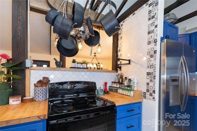 kitchen with black electric range, blue cabinets, wooden counters, and stainless steel fridge with ice dispenser