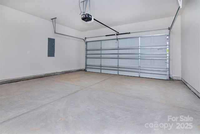 garage with electric panel, baseboards, and a garage door opener