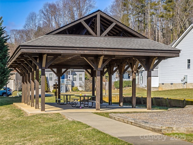 view of community with a lawn and a gazebo