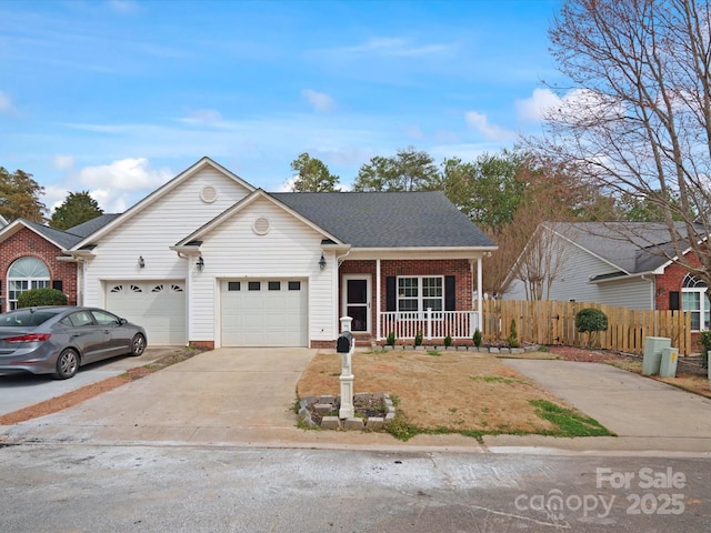 ranch-style home with driveway, a garage, covered porch, fence, and brick siding