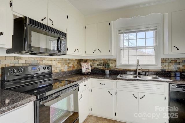 kitchen with black appliances, a sink, white cabinetry, and decorative backsplash