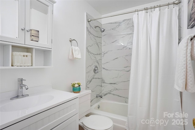 bathroom with shower / bath combo, vanity, and toilet