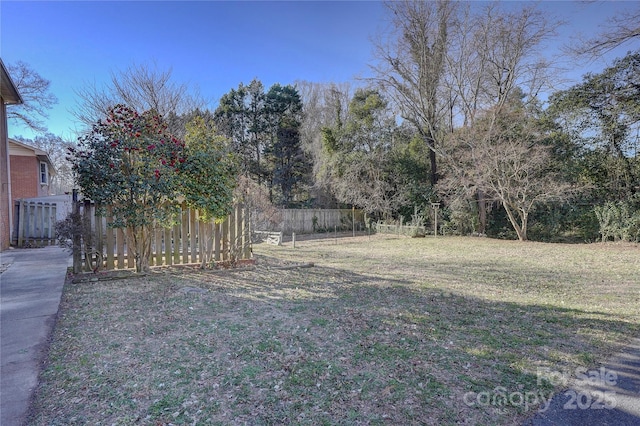 view of yard featuring fence