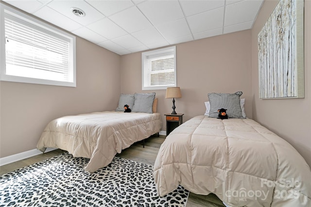 164 Waldsi Ct, Brevard, NC 28712 - bedroom featuring wood finished floors and a paneled ceiling