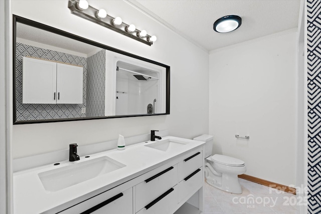 full bath with a shower with curtain, double vanity, a sink, and tile patterned floors