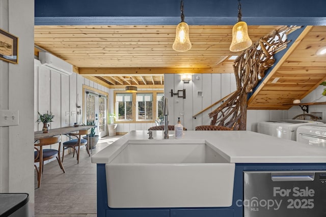 kitchen with hanging light fixtures, a wall mounted air conditioner, a sink, and wood ceiling