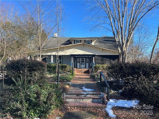 bungalow-style home with covered porch