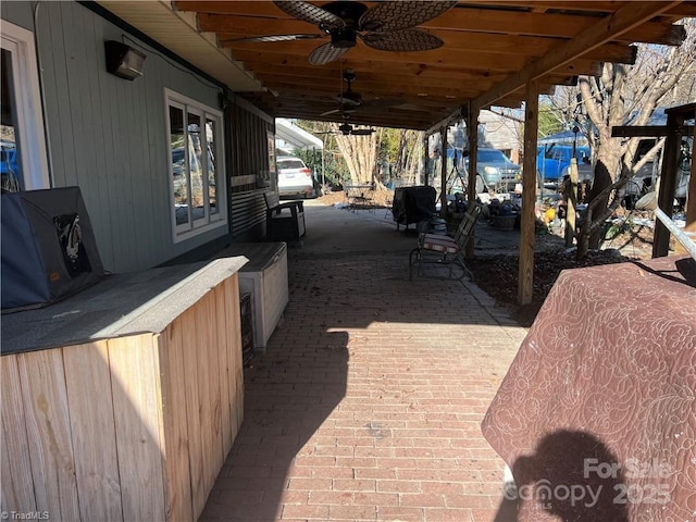 view of patio / terrace featuring a ceiling fan