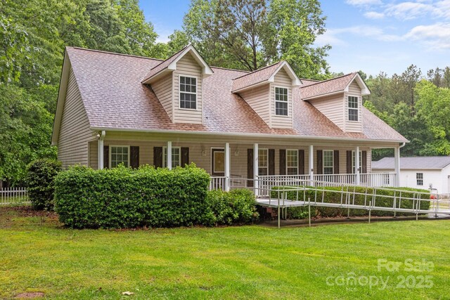 3039 Paraham Rd S, York, SC 29745 - new england style home featuring covered porch, a front lawn, and roof with shingles