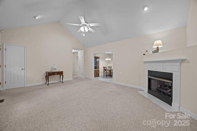 3039 Paraham Rd S, York, SC 29745 - unfurnished living room with ceiling fan, light colored carpet, high vaulted ceiling, a fireplace with flush hearth, and baseboards