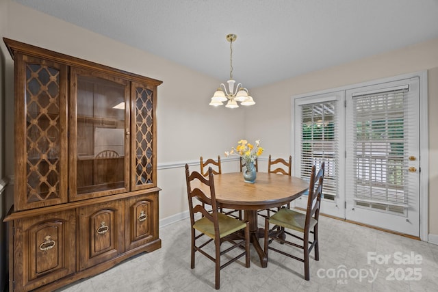 3039 Paraham Rd S, York, SC 29745 - dining room with a chandelier and baseboards