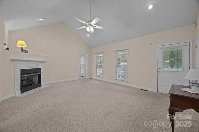 3039 Paraham Rd S, York, SC 29745 - living area featuring a ceiling fan, baseboards, carpet flooring, and high vaulted ceiling