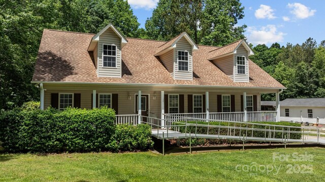 3039 Paraham Rd S, York, SC 29745 - new england style home with a porch, roof with shingles, and a front lawn