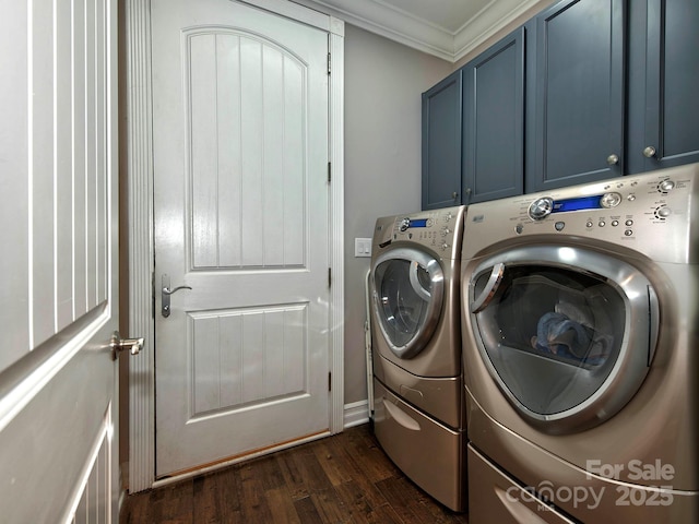 washroom featuring independent washer and dryer, cabinet space, and crown molding