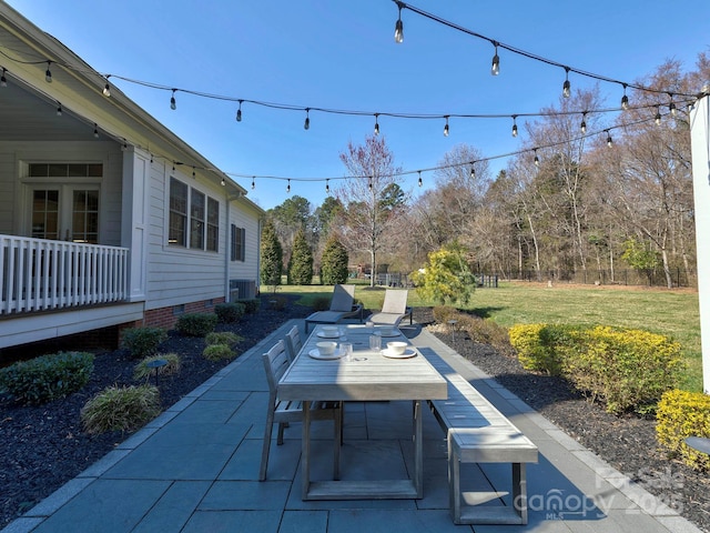 view of patio with fence and central AC