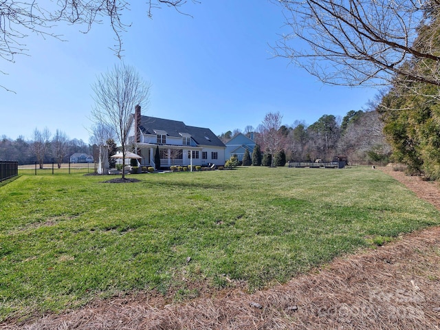 view of yard with fence