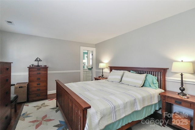 bedroom featuring visible vents