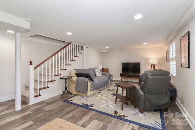 living room with baseboards, stairway, wood finished floors, and recessed lighting