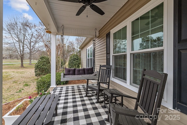 view of patio / terrace with a ceiling fan