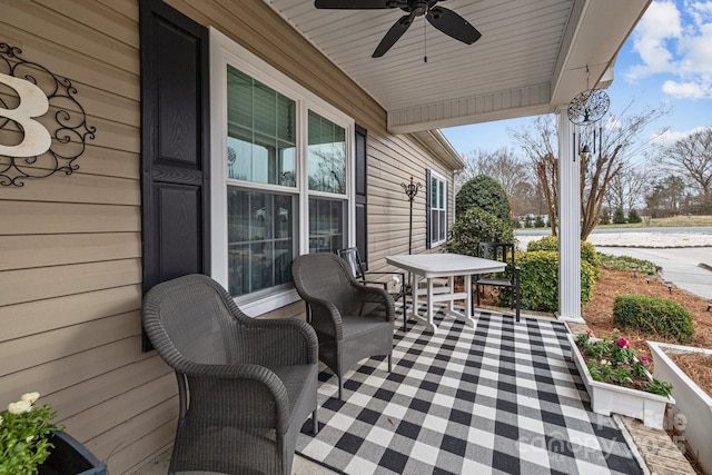 view of patio featuring a ceiling fan and covered porch