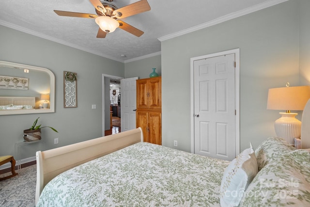 bedroom with ceiling fan, a textured ceiling, and ornamental molding