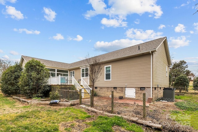 exterior space with crawl space, a wooden deck, central AC, and stairs