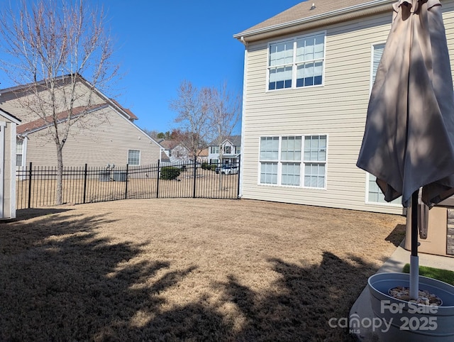 view of yard with fence