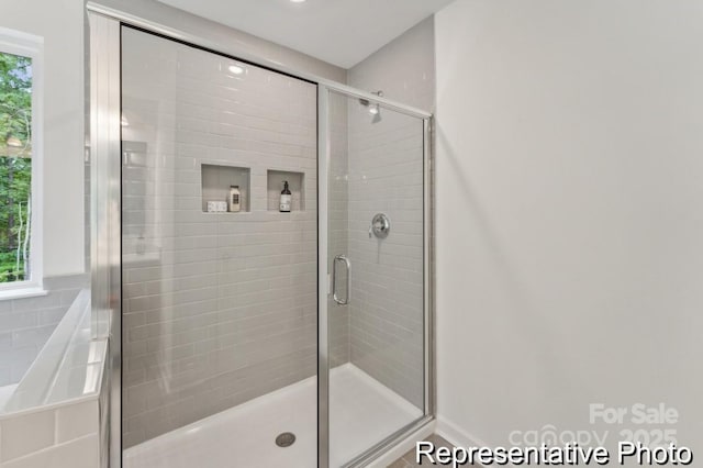 bathroom with a stall shower