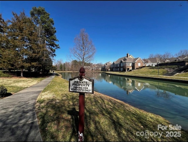 property view of water with a residential view