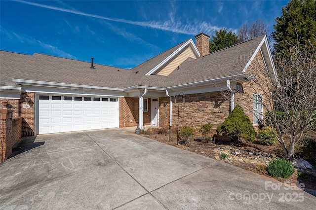 ranch-style home featuring stone siding, a chimney, a garage, concrete driveway, and a shingled roof