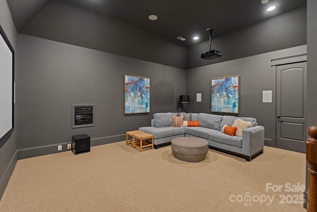 carpeted cinema with recessed lighting and baseboards